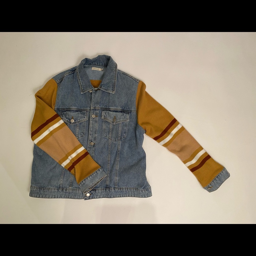 Stylish denim jacket with warm back and sleeves. Brand new, only worn once.